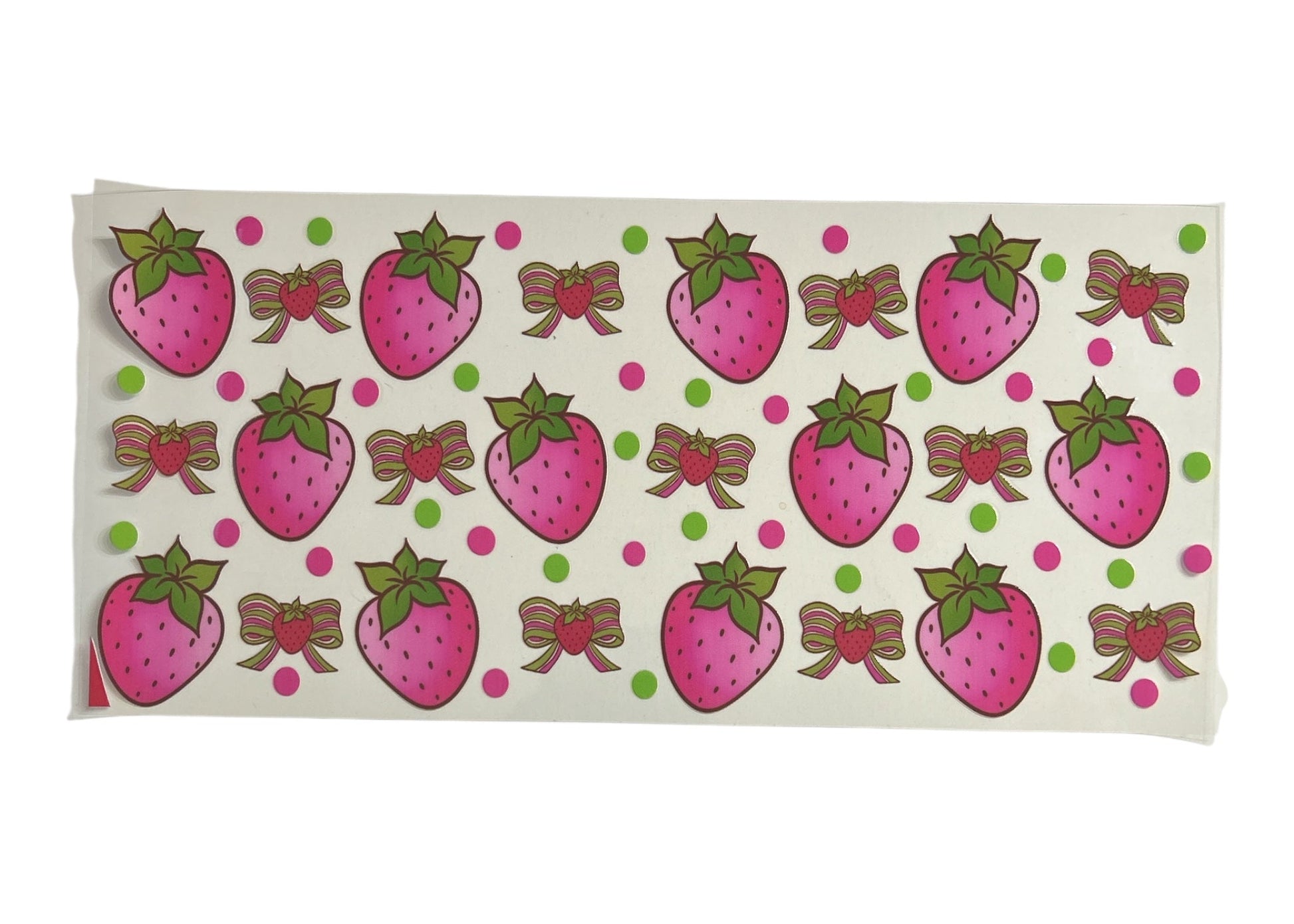 Cup wrap with pink strawberry and bow pattern on a white background