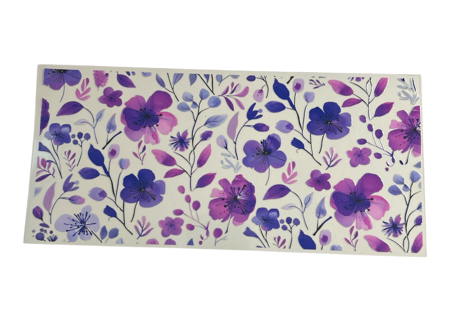 Floral patterned cup wrap with purple and pink flowers on a clear background