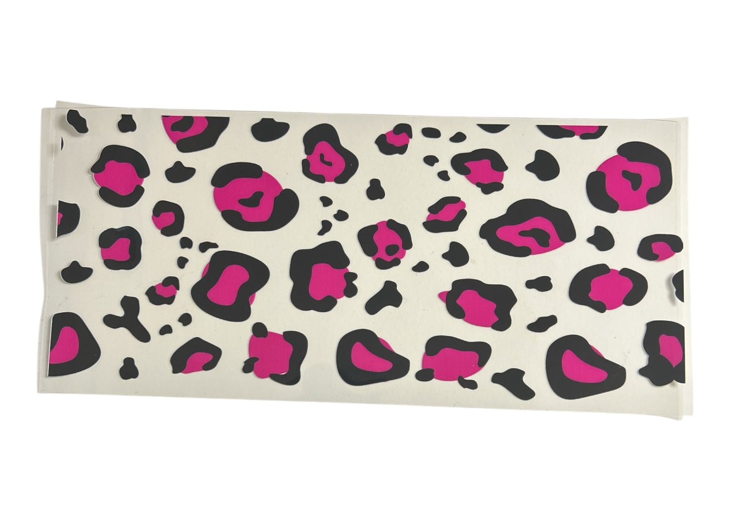 Cup wrap with pink and black leopard print on a clear background