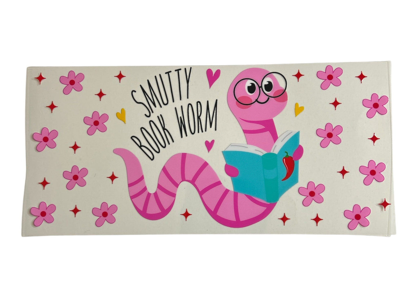 Cup wrap with a pink worm reading a book and flowers on a beige background