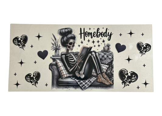 Skeletal character lounging on a couch with decorative elements and 'Homebody' text on a beige background.