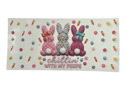 Three decorative bunnies with polka dots on a white background with Easter elements.
