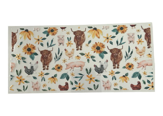 Patterned cup wrap with farm animals and flowers on a clear background