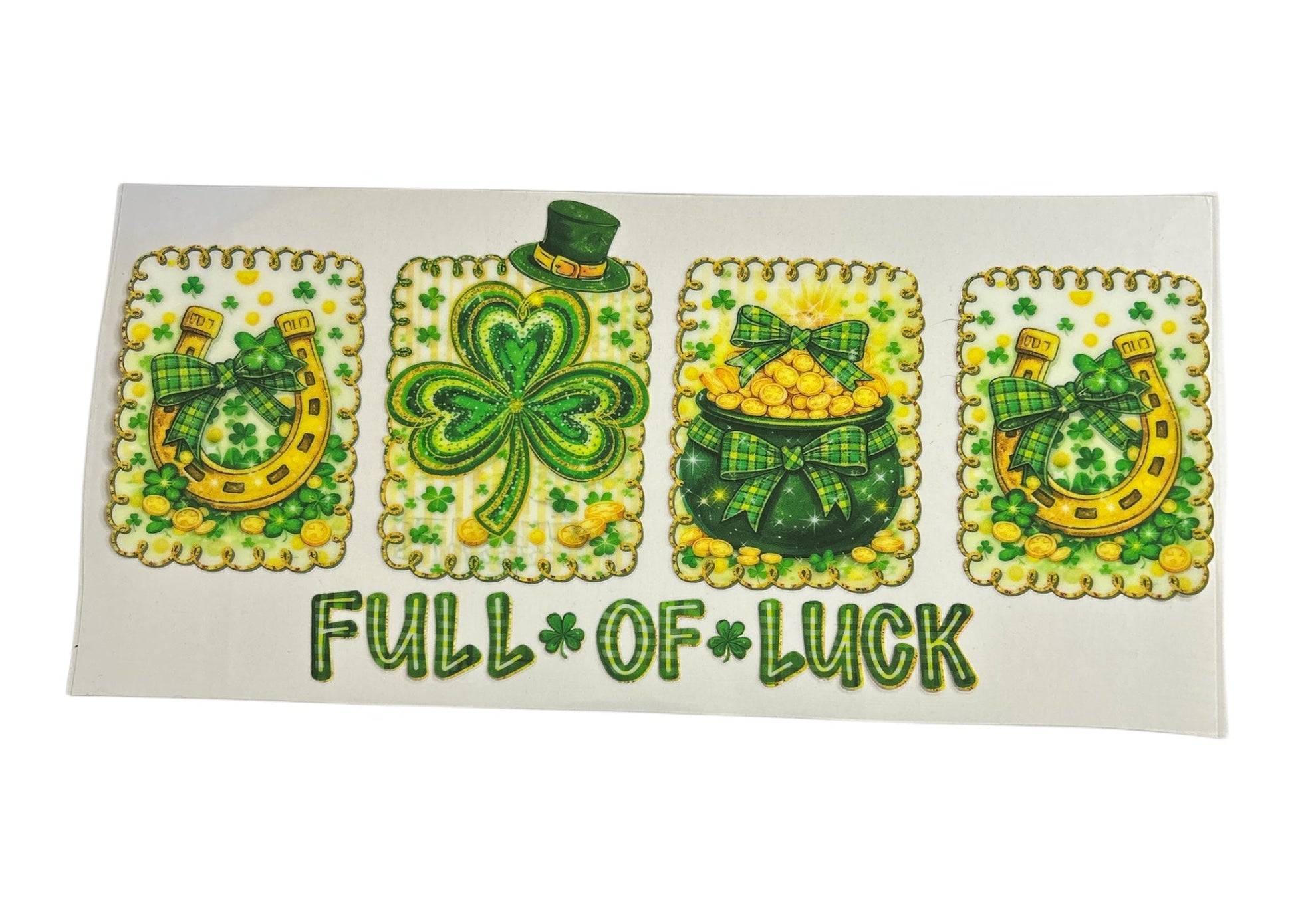 St. Patrick's Day cup wrap featuring four scalloped decorative panels with golden horseshoes, a leprechaun-hatted shamrock, and a pot of gold, above the text "FULL OF LUCK."
