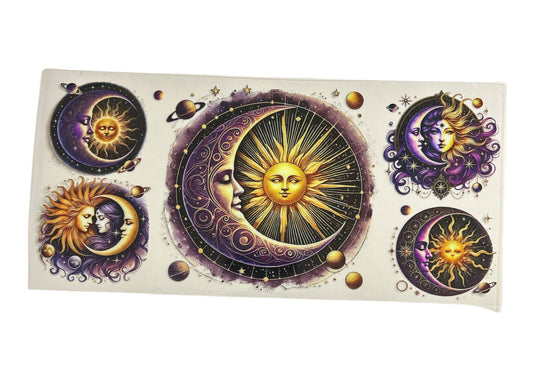 Mystical cup wrap featuring various circular emblems of the sun and crescent moon intertwined with human faces, surrounded by planets and stars in a purple and gold watercolor style.