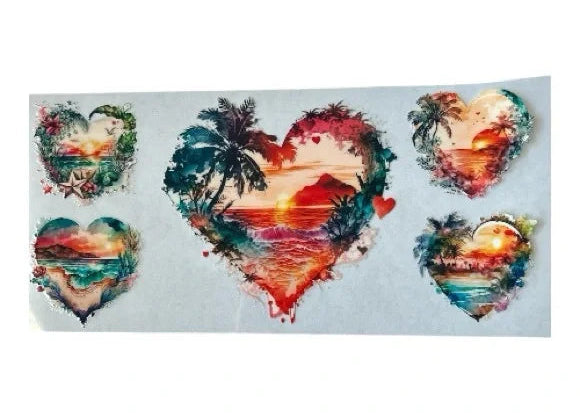 Set of heart-shaped cup wrap stickers with tropical designs on a white background